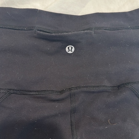 Black Lululemon Athletica High Rise Criss Cross Ankle Leggings - Picture 6 of 8